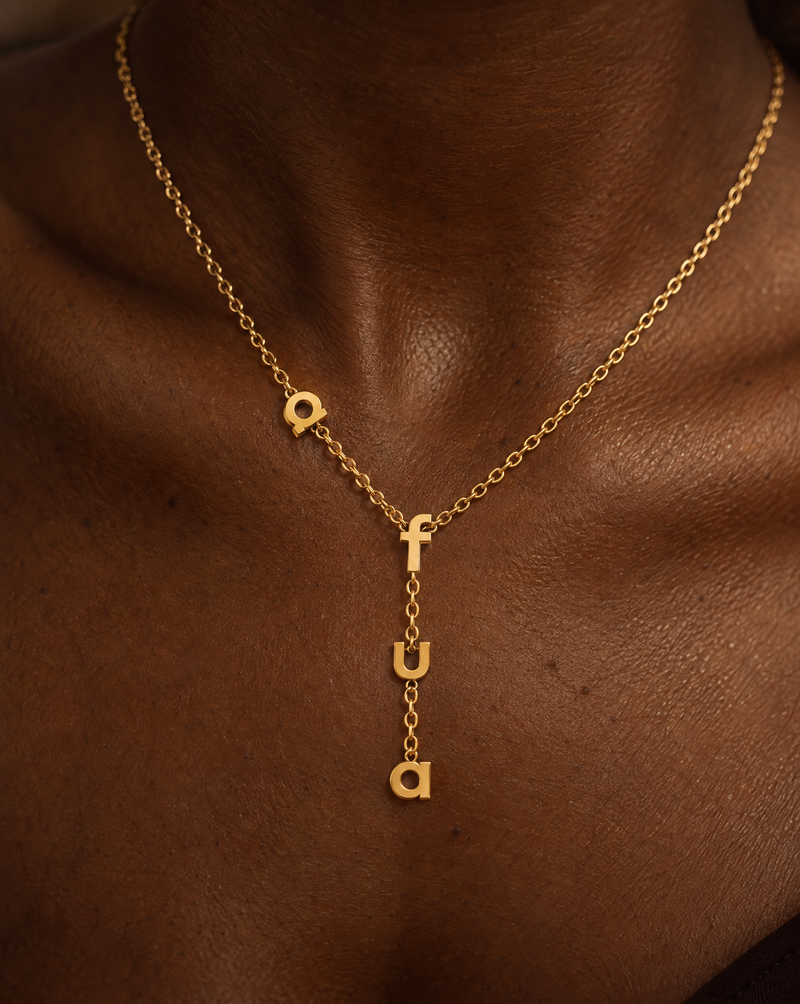 Afua name necklace on a model
