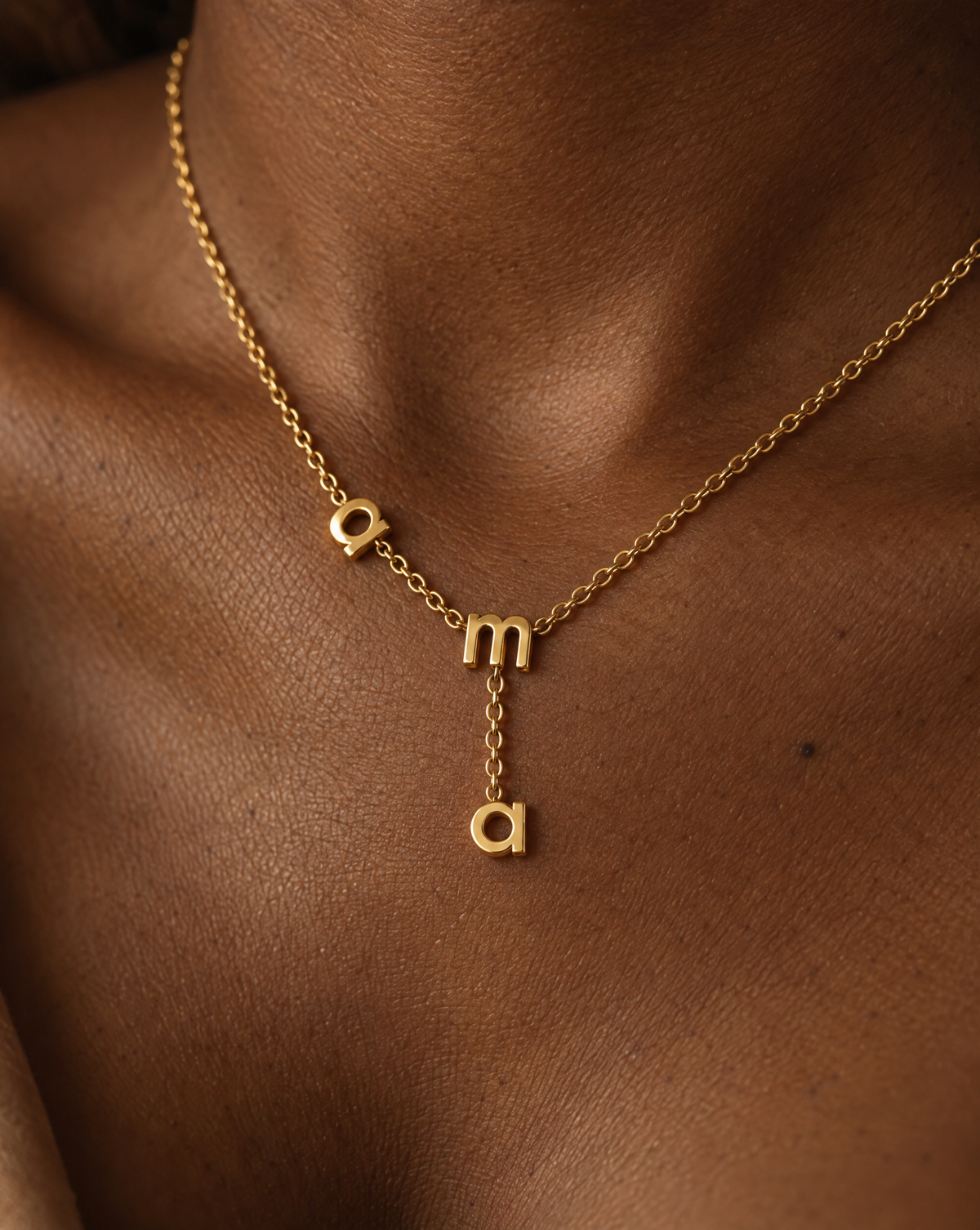 Ama Name Necklace on a model
