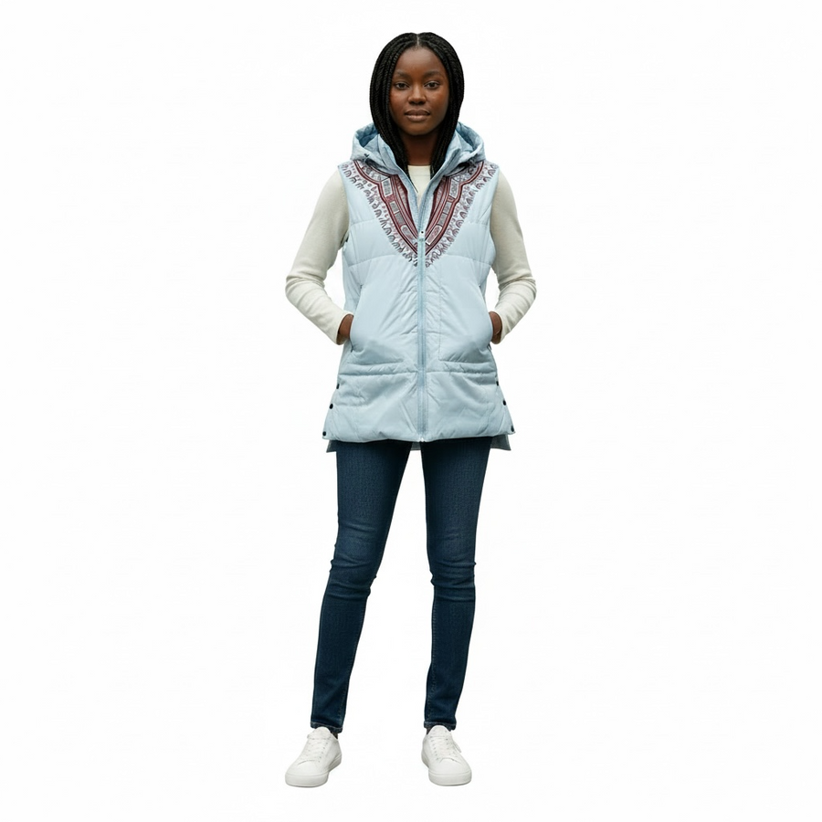 Harmattan Dashiki Hooded Puffer Vest – Red on Blue on a model